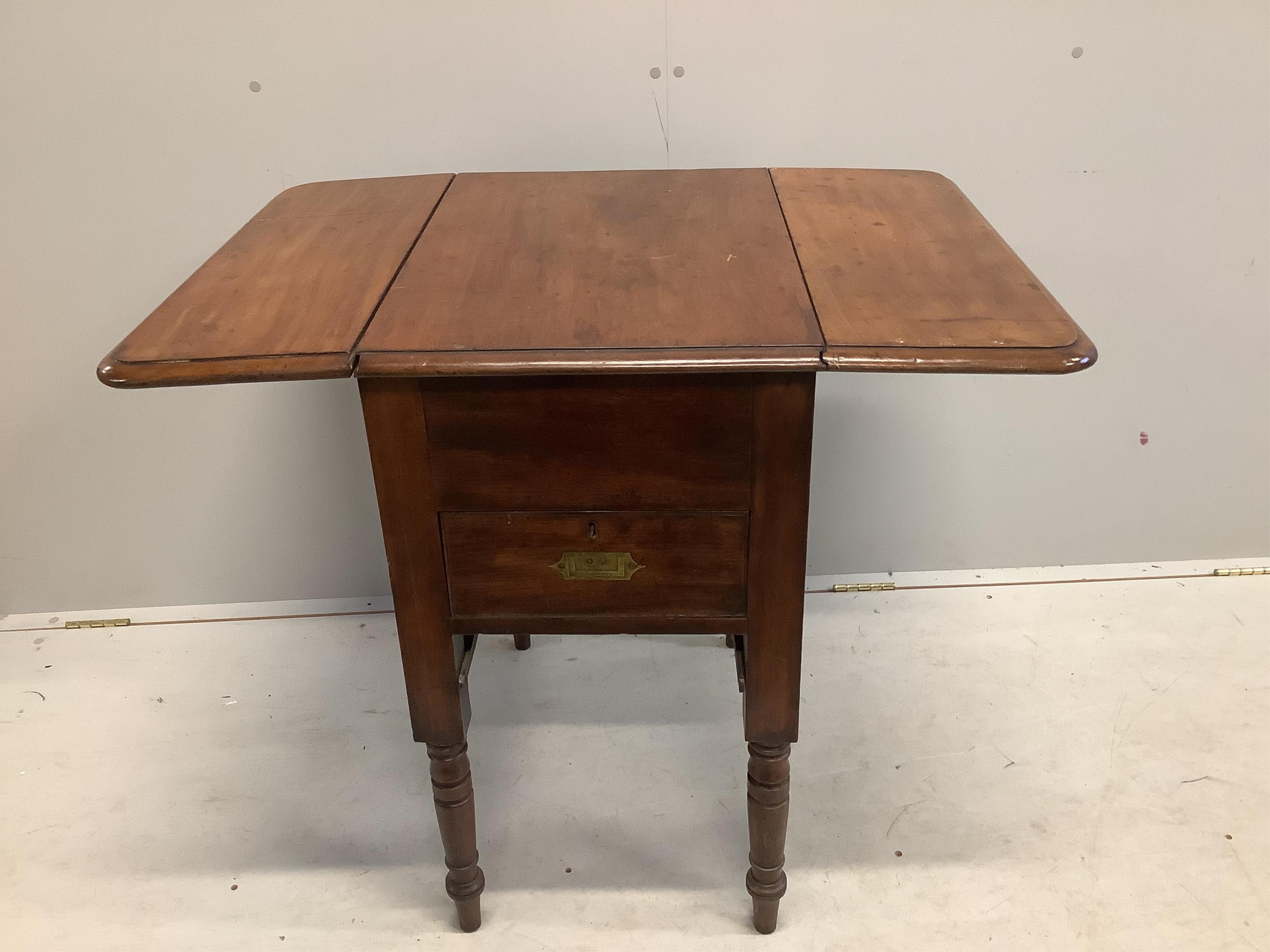 A Victorian mahogany military drop flap table, width 66cm, depth 48cm, height 79cm. Condition - fair